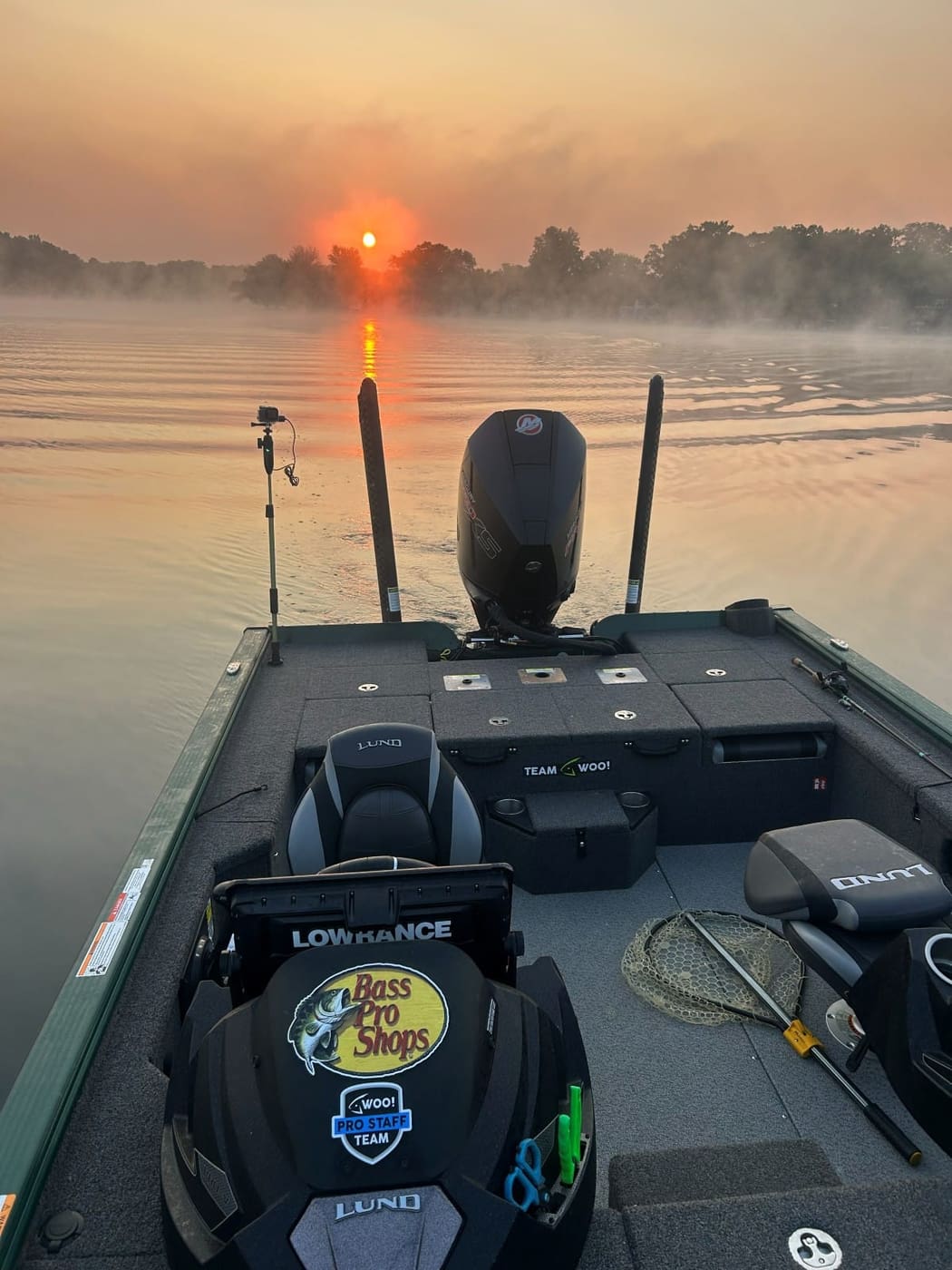 Sunrise on the water from the deck of the boat